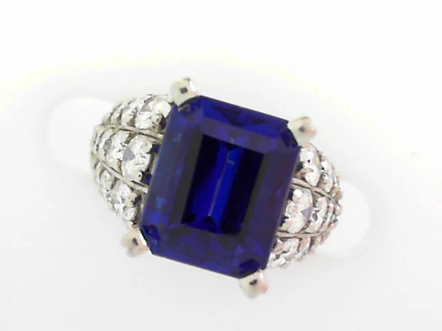 women’s custom gold engagement rings-Platinum Emerald-Cut Tanzanite and Round Diamond Ring